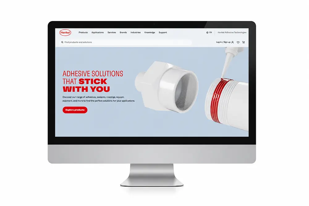Pantalla de monitor con el sitio web de Henkel Adhesive Technologies.