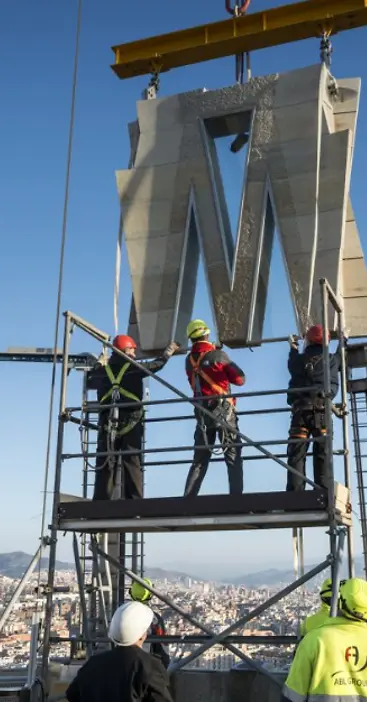 Assembly of prefabricated structural panels at height during tower construction