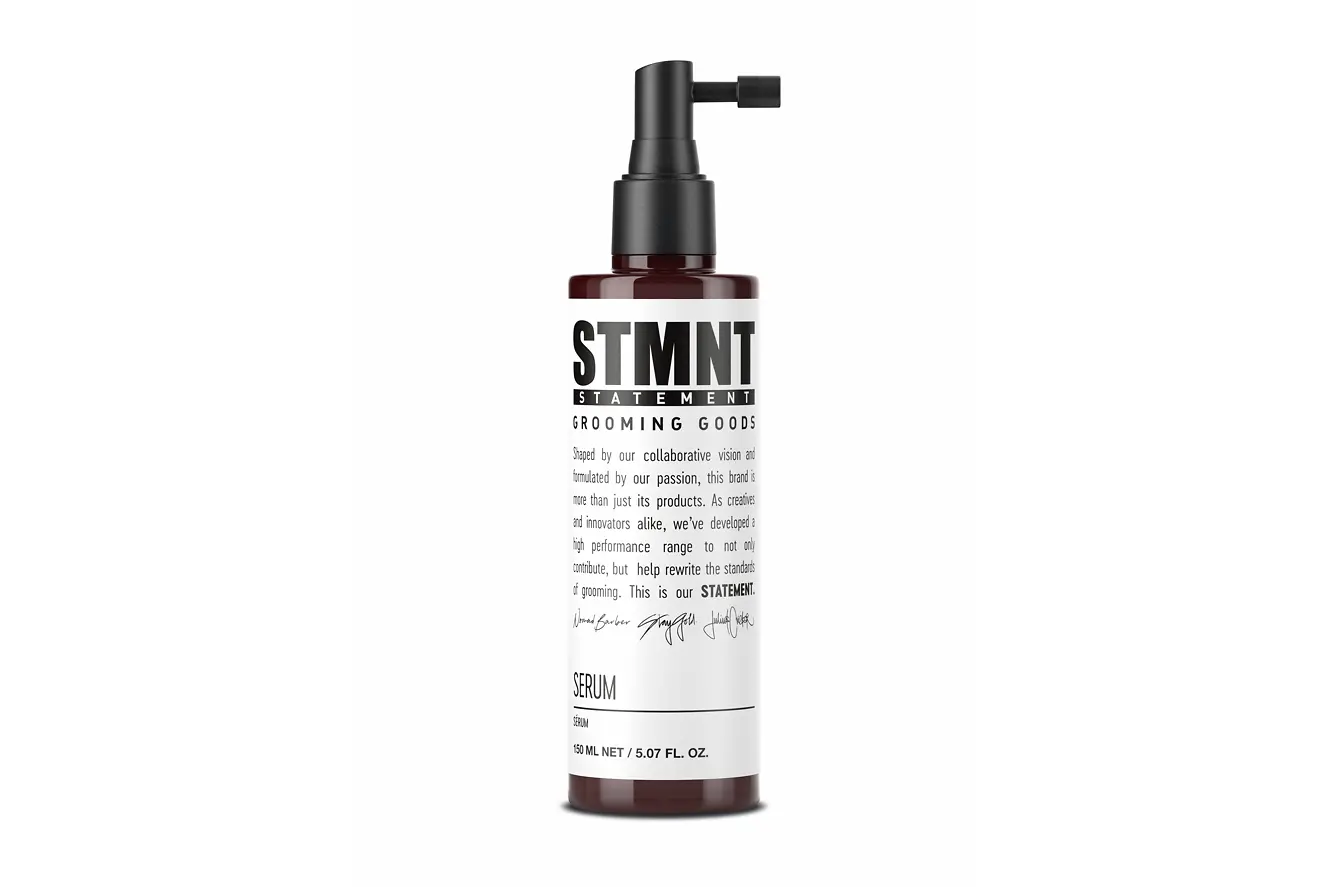 Envase de sérum para cuero cabelludo de STMNT con aplicador.