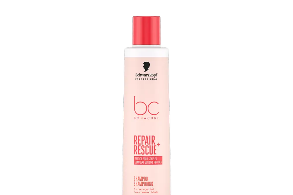 Envase de Bonacure Repair Rescue Champú, formulado para limpiar y fortalecer el cabello dañado.