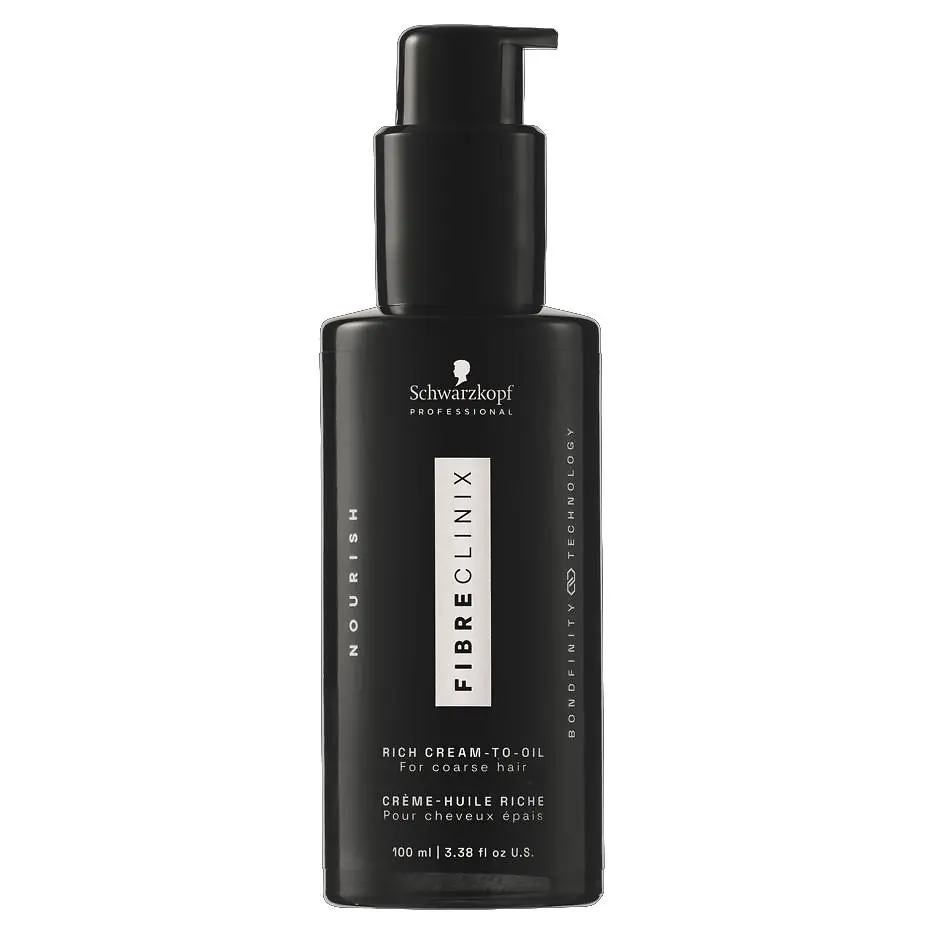 Botella de Fibre Clinix Aceite en Crema Intensivo para nutrir y controlar el encrespamiento.